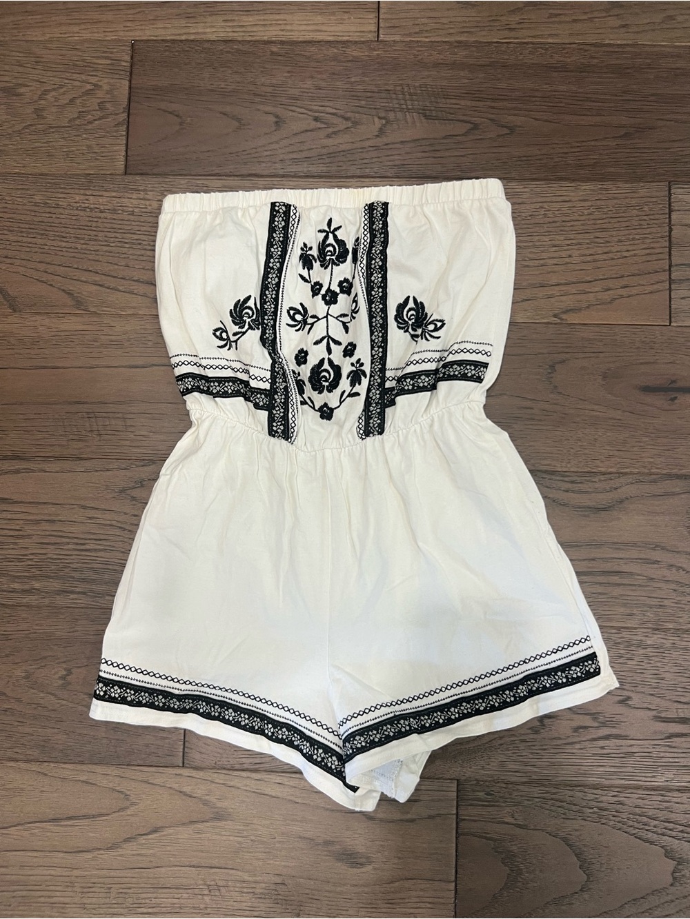White Strapless Embroidered Romper with Black Floral Accent
